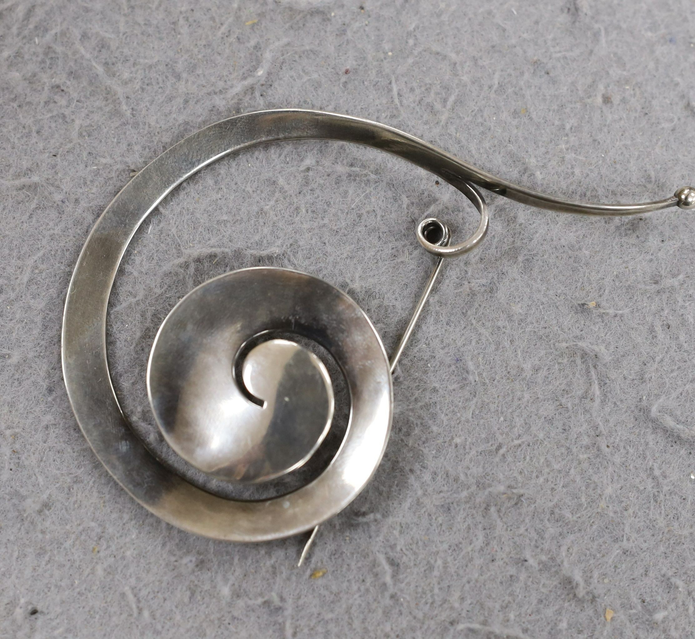 A Vivianna Torun for Georg Jensen sterling silver scroll brooch